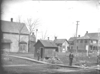 Martin at rail crossing at Main St. - 1908