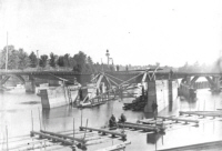 Lifting  wrecked locomotive from canal near swing bridge  1891