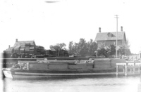 Lumber barge on canal 1892
