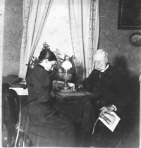 Victoria and Robert Lees playing backgammon - c1890