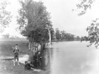 Henry Roche fishing on banks of Rideau River